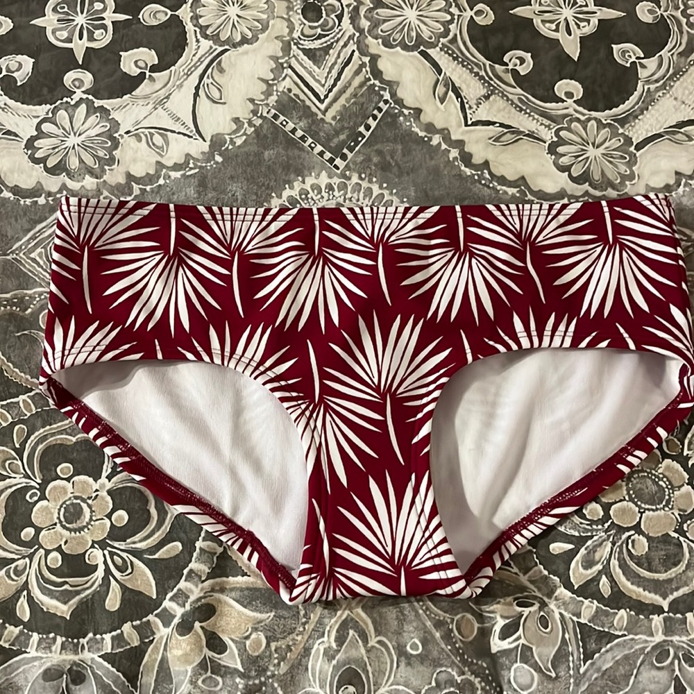 Hipster bikini bottoms. Matching tankini top is listed as well.